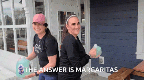 Person Filling Cups With Margarita
