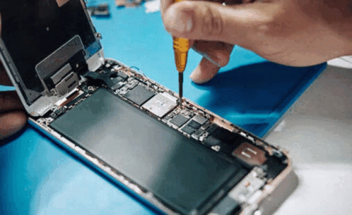 Person Fixing Cell Phone With Screwdriver GIF