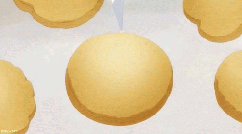Person Frosting Cookie with White Frosting Bag