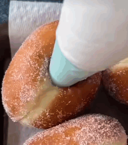 Person Frosting Donut GIF