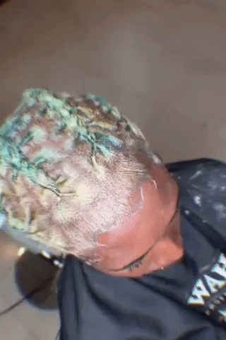 Person Getting Hair Dyed Green In Salon GIF