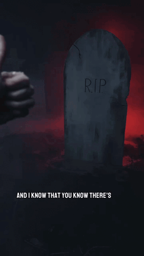 Person Giving Thumbs Up at Grave Saying RIP