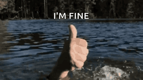 Person Giving Thumbs Up in Water Saying I'm Fine