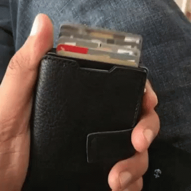Person Holding Black Wallet with Credit Cards