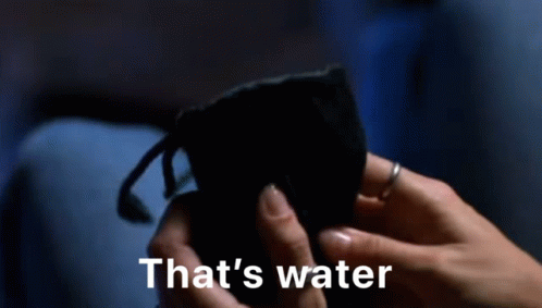 Person Holding Blue Bottle Saying That's Water GIF