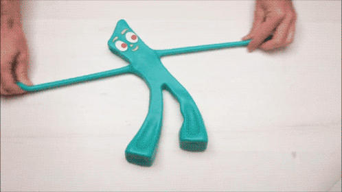 Person Holding Blue Googly-Eyed Object