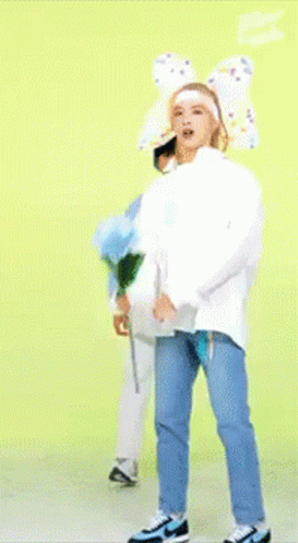 Person Holding Bouquet of Blue Flowers