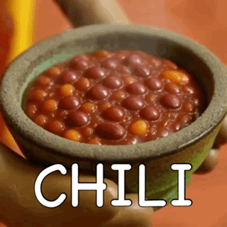 Person Holding Bowl of Chili