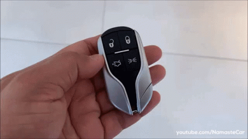 Person Holding Car Key Fob youtube.com/namastecar