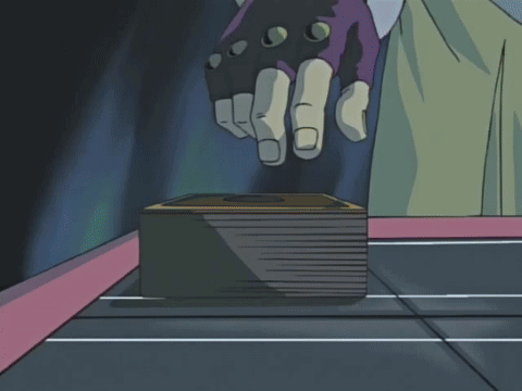 Person Holding Card with Cross