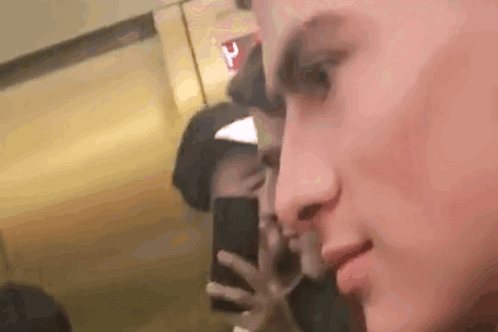 Person Holding Cell Phone