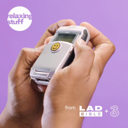 Person Holding Cell Phone With Smiley Face in Front of Relaxing Stuff Logo