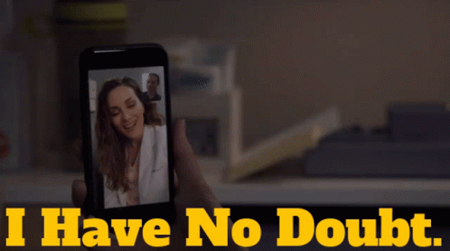 Person Holding Cellphone With Woman Picture Saying I Have No Doubt
