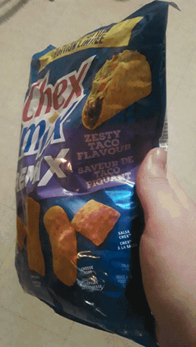 Person Holding Chex Mix Taco Flavour Chips