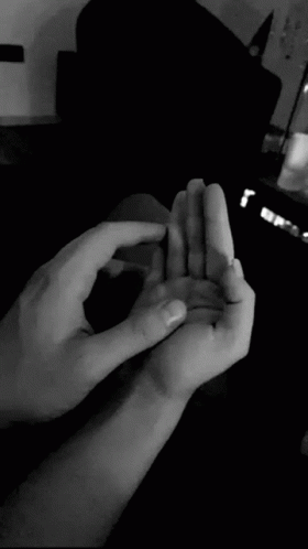 Person Holding Child's Hand Black And White GIF