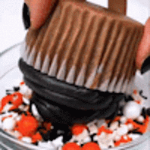 Person Holding Chocolate Peanut Butter Cup
