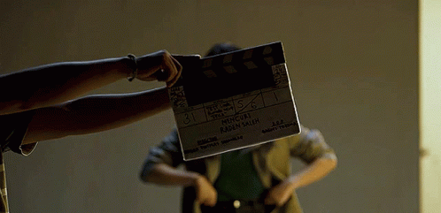 Person Holding Clapper Board Saying Mercury