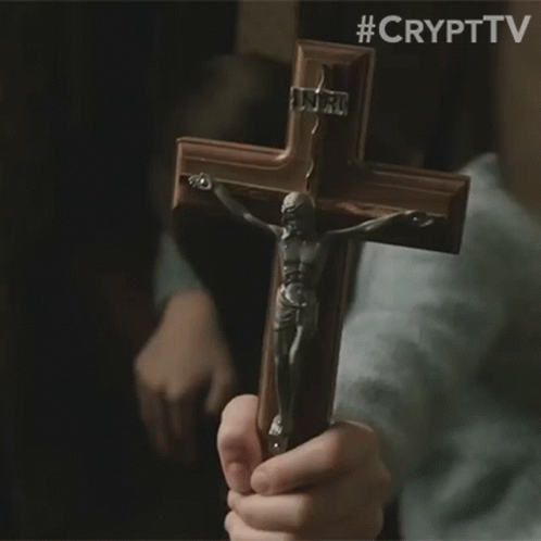 Person Holding Cross With Jesus