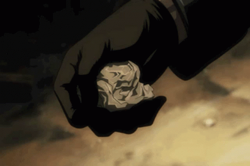 Person Holding Crumpled Paper