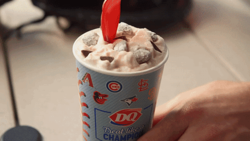 Person Holding DQ Treat Like A Champion Ice Cream GIF