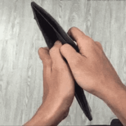 Person Holding Empty Wallet GIF
