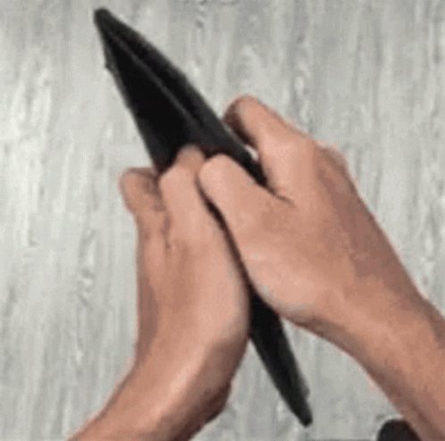Person Holding Empty Wallet Folding It