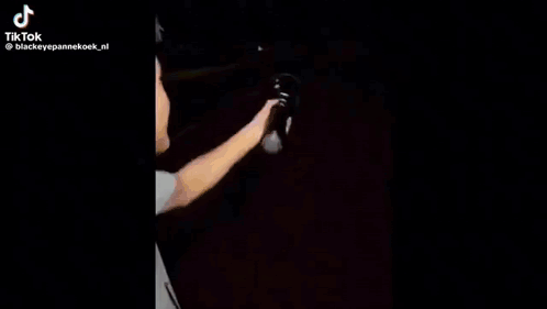Person Holding Flashlight Walking