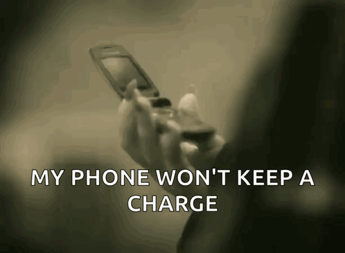 Person Holding Flip Phone Saying My Phone Won't Keep a Charge