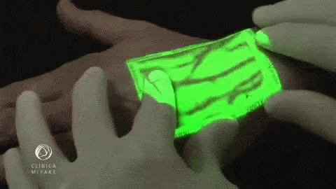 Person Holding Glowing Paper GIF