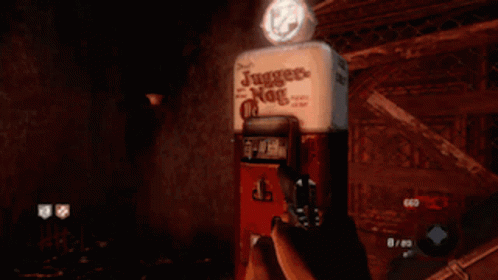 Person Holding Gun in Front of Juggler Nog Box