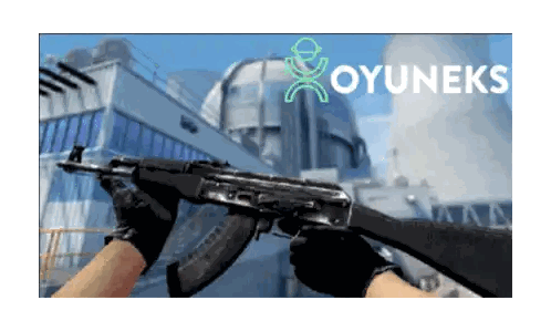Person Holding Gun in Front of Oyuneks Building
