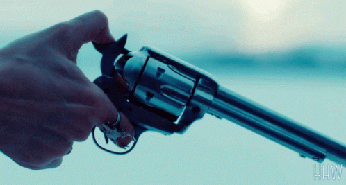 Person Holding Gun With HHW Letters