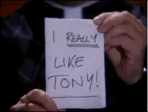 Person Holding I Really Like Tony Paper