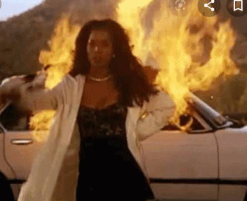 Person Holding Lighter with Flame