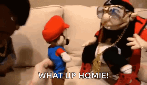 Person Holding Mario Puppet and Saxophone Puppet