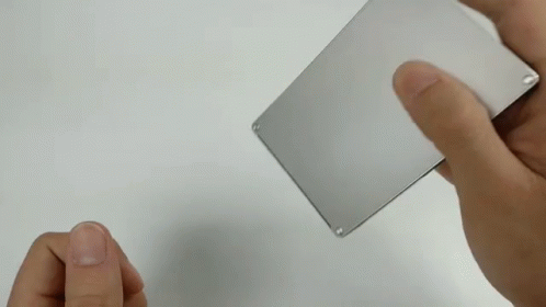 Person Holding Metal Phone GIF