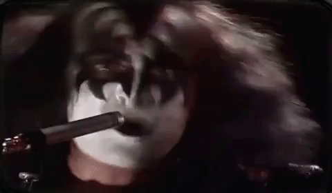 Person Holding Microphone In Mouth GIF