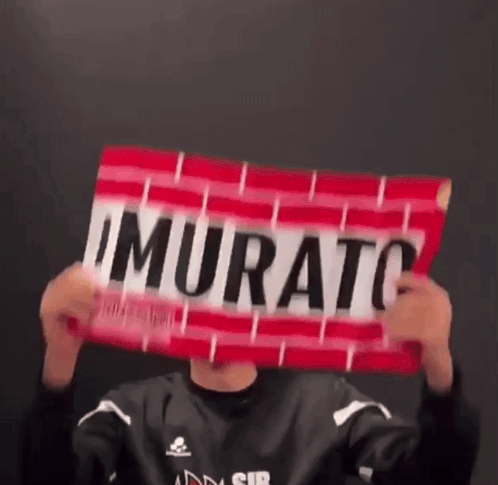 Person Holding Murato Sign GIF