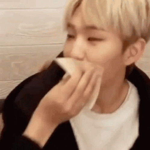 Person Holding Napkin To Face GIF
