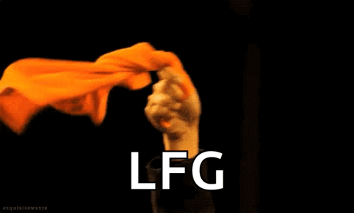 Person Holding Orange Cloth Saying LFG