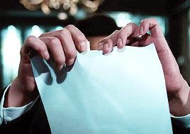 Person Holding Paper