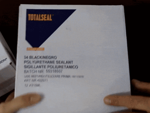 Person Holding Paper With Recycling Symbol GIF