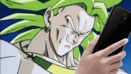 Person Holding Phone in Front of Dragon Ball Character