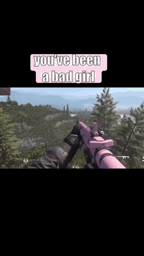Person Holding Pink Gun Saying You've Been a Bad Girl