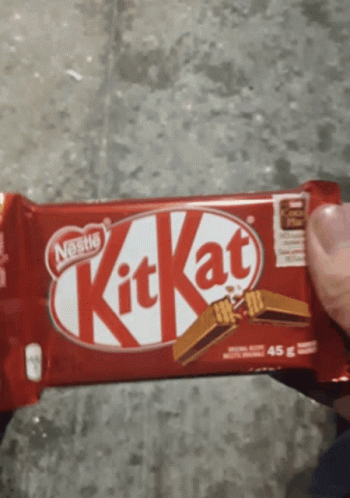 Person Holding Red KitKat Bar GIF