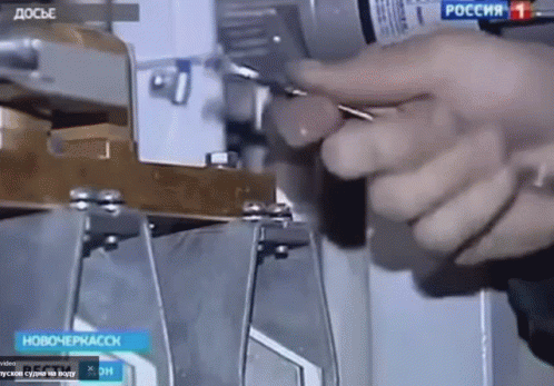 Person Holding Screwdriver GIF