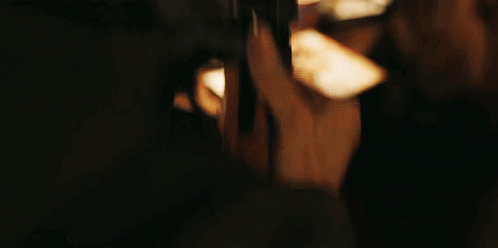 Person Holding Shotgun GIF