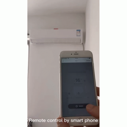 Person Holding Smartphone Near Air Conditioner GIF