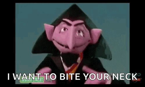 Person Holding Sony Controller GIF