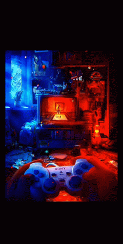 Person Holding Sony Controller GIF